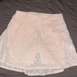 Brand new Nike athletic pink skirt with pockets and shorts lined